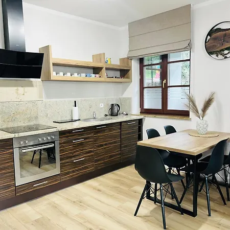 W Rezydencji Pod Swierkami Apartman *